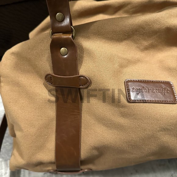 SOLD - RARE FOLKLORE TAYLOR SWIFT leaving out the side door duffle bag - Picture 2 of 7